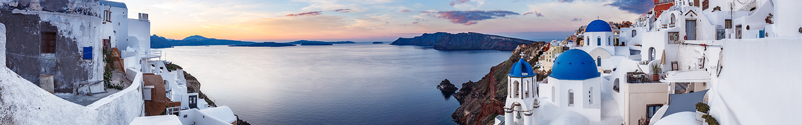 Panorama view of Santorini island in Greece at sunrise